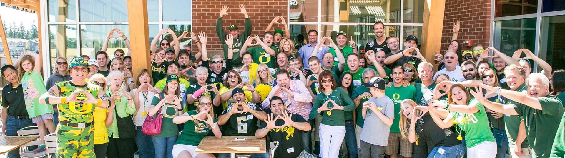 Alumni and friends at a chapter watch party