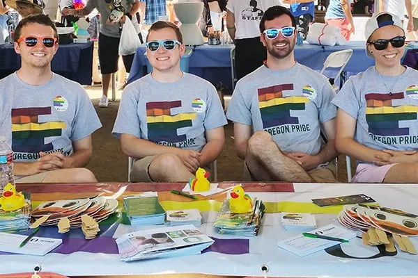 Four members of the University of Oregon Pride team